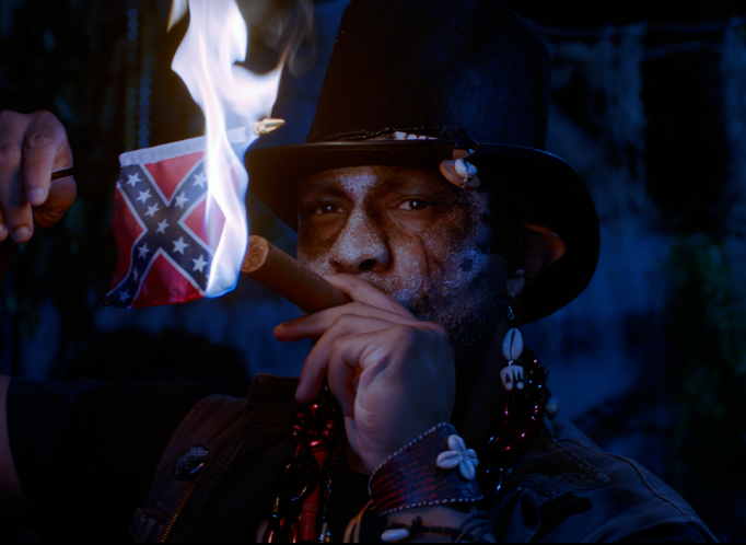 Dr. Tom lights his cigar before embarking on his hunt for vampires